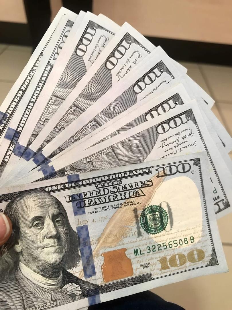 Cleaned US $100 Banknotes fanned out